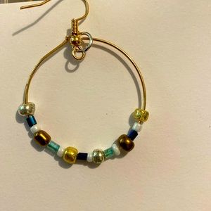 Made with lots of love this very special earring has many beautiful colors!